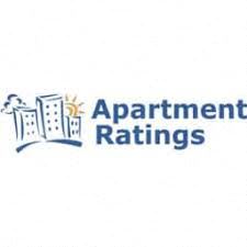 A logo of a building with a book on top of it